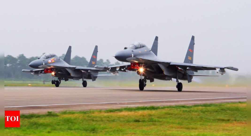 Warplanes: China sends large group of warplanes, navy ships towards Taiwan in forceful display – Times of India