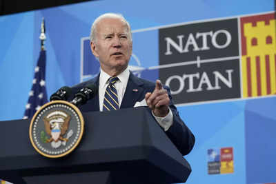 Nato summit: Joe Biden hits out at 'craven' Putin