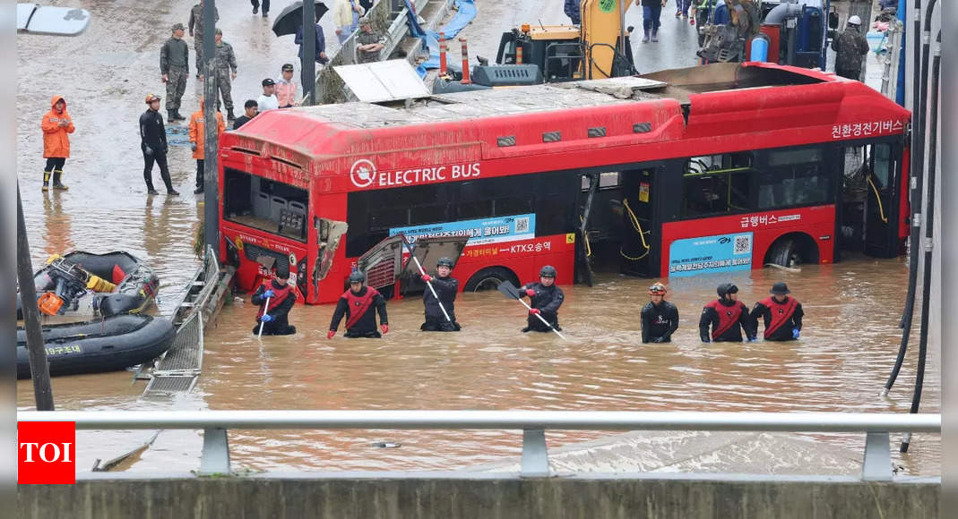 9 bodies pulled from a flooded road tunnel in South Korea as rains cause flash floods and landslides – Times of India