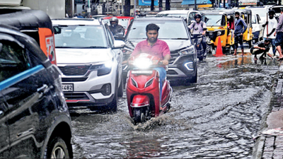 Capital crawls: Traffic gridlocks turn rain-swept city into a maze