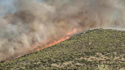 Extreme heat sparks wildfires, health warnings