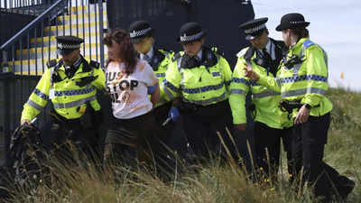 Just Stop Oil protesters set off orange flare at British Open