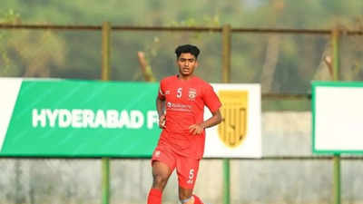 Reliance Foundation Young Champs bag brace with two graduates signing ISL contracts