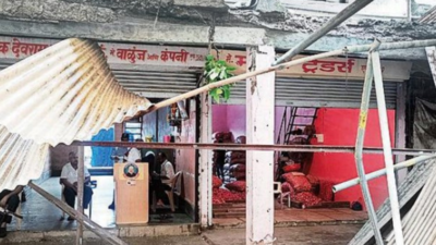 Tin roof of 2 adjoining shops and parts of canteen at APMC market collapse