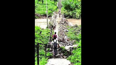 Portion of lower bridge on Bhukhi Kaans at MSU collapses