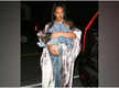 
Pregnant Rihanna shows off baby bump at dinner with son RZA
