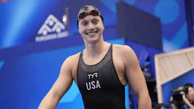 Katie Ledecky wins 1,500m freestyle for 20th world swimming title ...