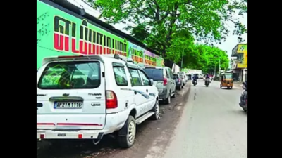 Mechanic shops, car dealers encroach on road for over 10 yrs