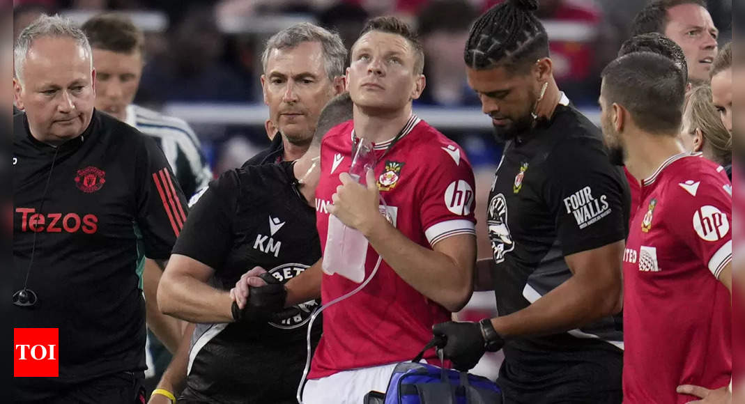 Wrexham: Wrexham’s Paul Mullin suffers punctured lung in pre-season friendly against Manchester United | Football News – Times of India