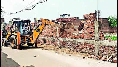 Illegal construction rampant, MC razes 8 structures
