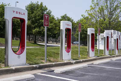 In challenge to Tesla, automakers launch EV charging network