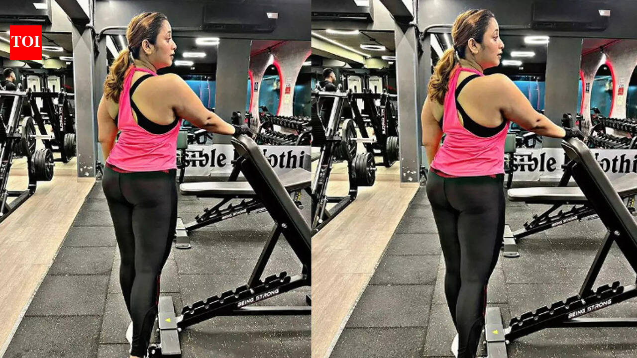Rani Chatterjee poses in her athleisure - pink tee and black jogger pants