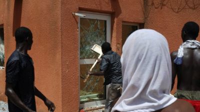 French embassy in Niger attacked as protesters waving Russian flags march through capital