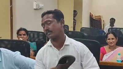Narsipatnam municipality councillor Ramaraju slaps himself with slipper for failing to fulfil promises in his ward
