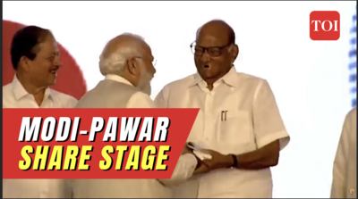 PM Narendra Modi shares stage with NCP chief Sharad Pawar at Tilak awards function