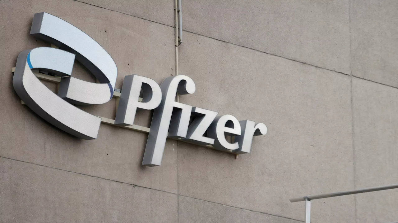 Pfizer trims 2023 revenue outlook as profits tumble - Times of India