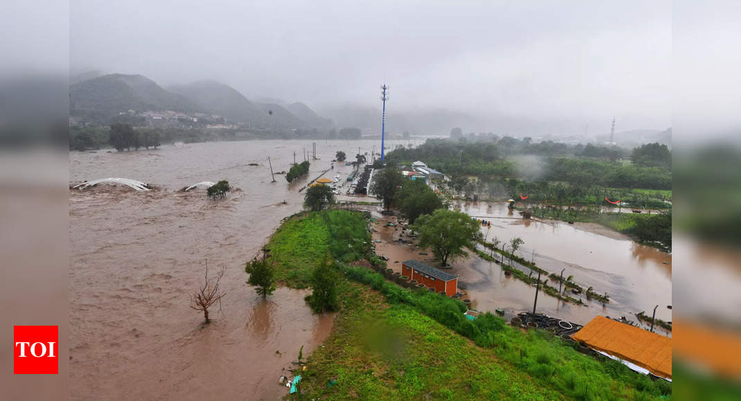 Flooded rivers, cities test China’s disaster response systems