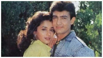 Did you know Madhuri Dixit once chased Aamir Khan with a hockey stick in her hand for THIS reason?