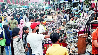 Free up road space, pavements or face action, KMC tells hawkers