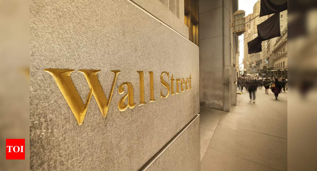 Wall Street swings after inflation data, ends little changed – Times of India