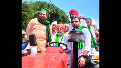 Farmers join protest march against govt on tractors