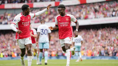 Arsenal survive Forest scare to make winning Premier League start