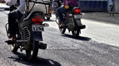 Rain scatters road material, bikers skid on loose gravel in Pune