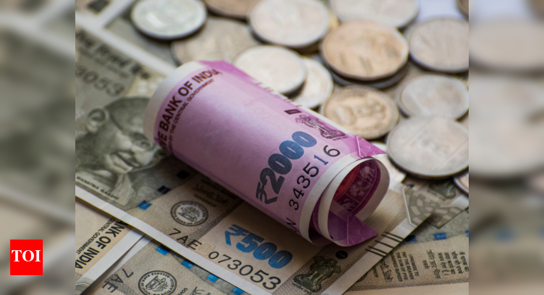 Rupee falls 25 paise to 83.07 against US dollar in early trade - Times ...