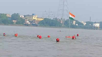 Young swimmers hoist flag mid-stream in Ganga in unique Independence Day celebration