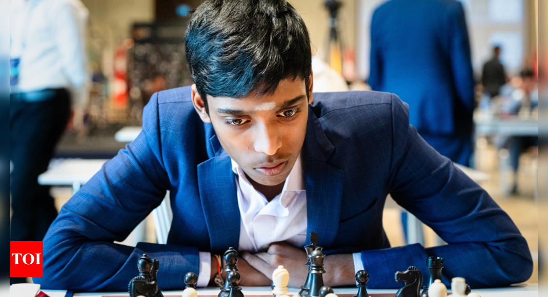 Two chess masters face off in an international tourn