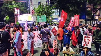 Commuters facing roadblock push back protesting students