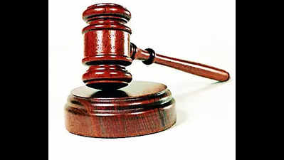 HC issues non-bailable warrant against dy secy