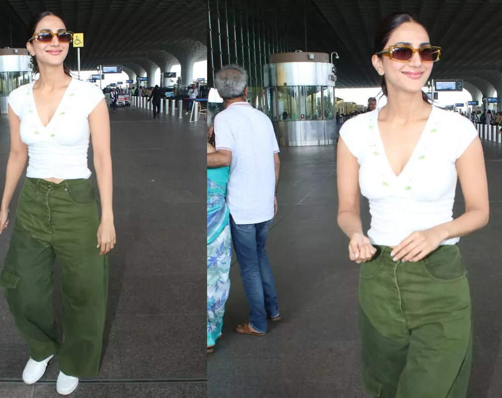 
Vaani Kapoor showcases an effortless yet stunning airport look in green coloured corduroy pants and white top
