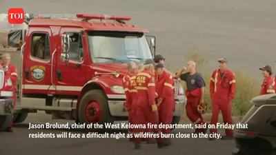 Columbia's Kelowna city battles intense wildfires with evacuations underway