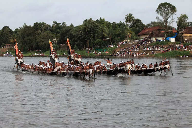Attend the Snake Boat Festival