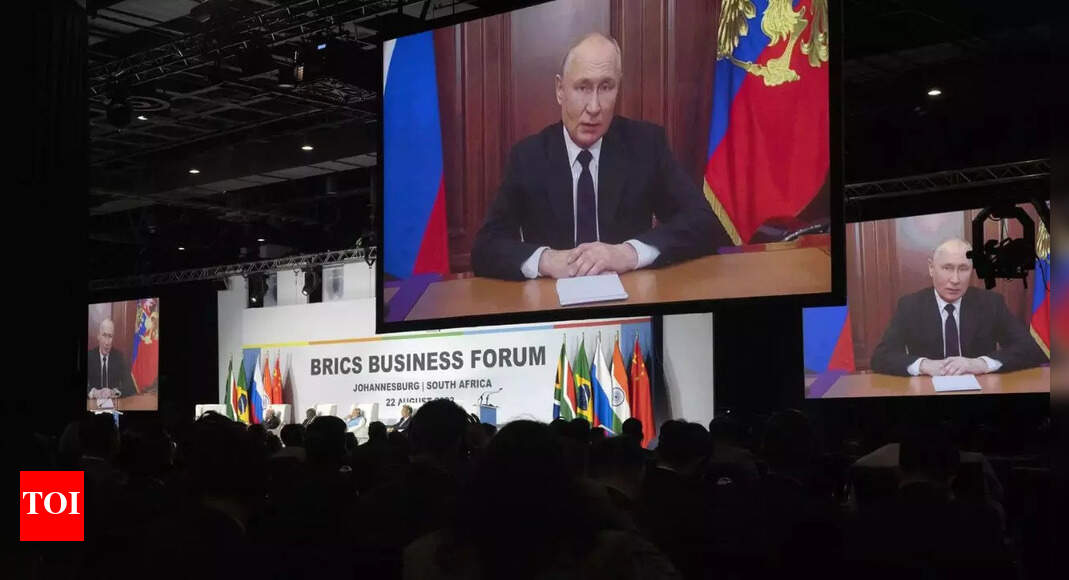 Putin: Russia's Putin attends Brics summit in South Africa remotely ...
