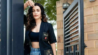 Esha Kansara's chic black ensemble paired with blue jeans turns heads