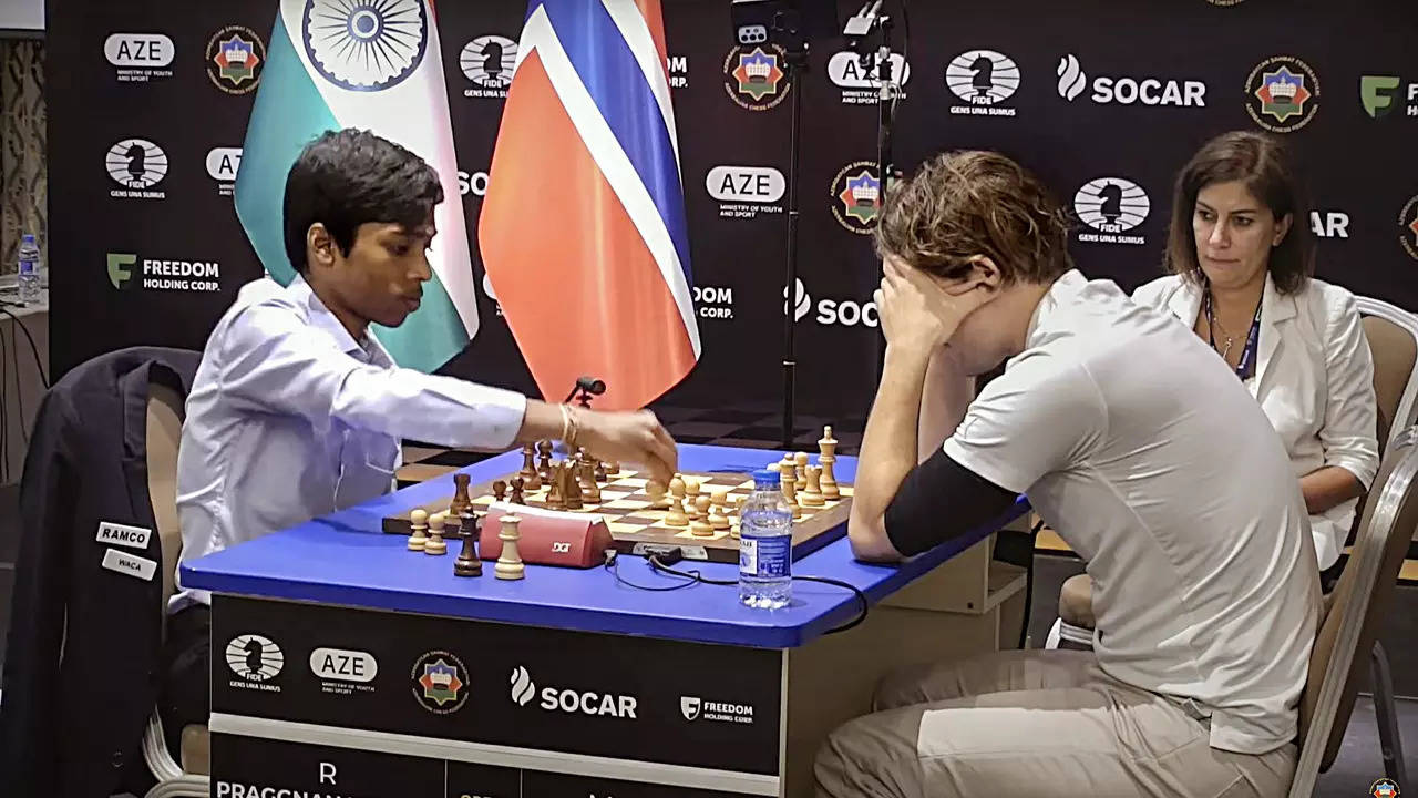 Indian chess prodigy Rameshbabu Praggnanandhaa smiles as his