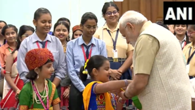 PM Modi celebrates Raksha Bandhan with school girls in Delhi