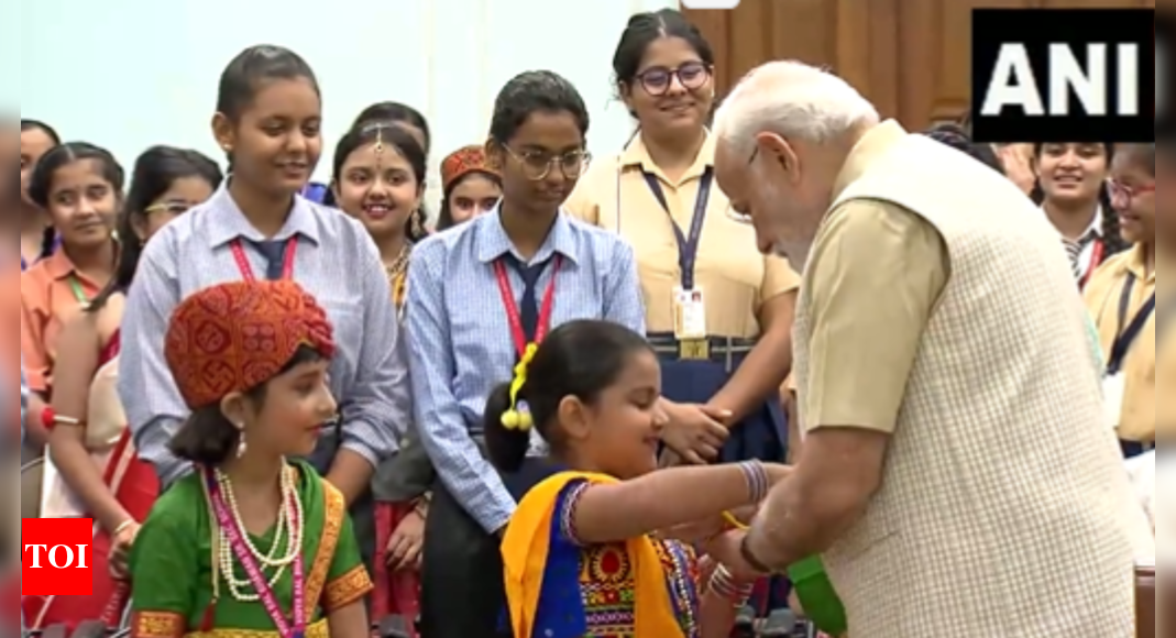 Modi in Delhi: PM Narendra Modi celebrates Raksha Bandhan with school girls in Delhi | India News – Times of India