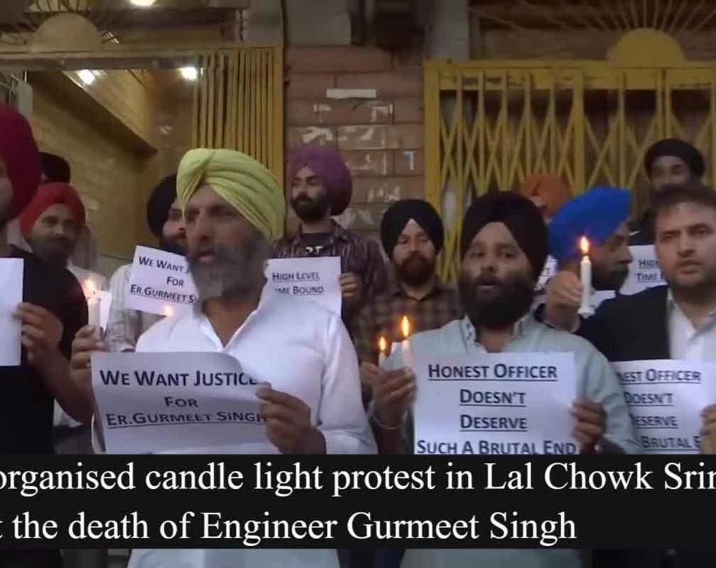 
In Lal Chowk, Srinagar, Sikhs orchestrated a candle light demonstration to express their grievance over the demise of Engineer Gurmeet Singh
