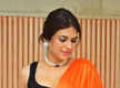 
Shraddha Das' stunning photoshoot in orange saree
