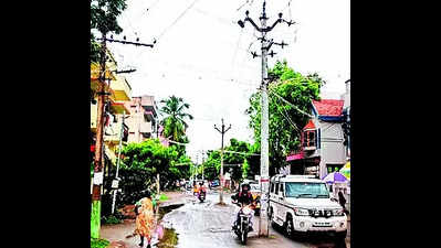 Residents of HMS Colony want electric poles shifted