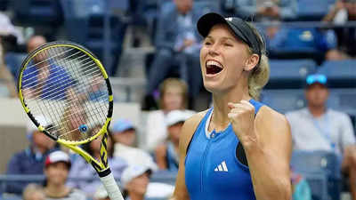 US Open: Caroline Wozniacki rallies to enter last 16