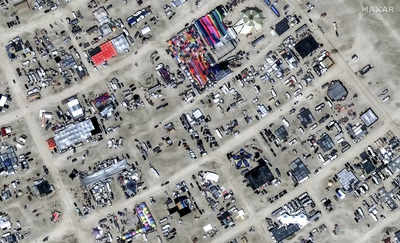 Desert rain leaves thousands stranded in muddy mess at Burning Man