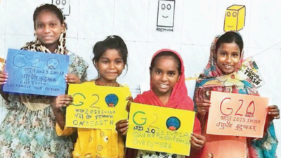 On other side of divide, slum kids want to know more about summit