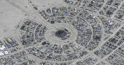 Wait times to exit Burning Man drop after flooding left tens of thousands stranded in Nevada desert