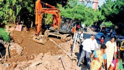 Section of newly laid road dug up for water project in Parvati | Pune ...