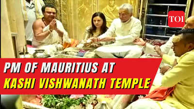 Varanasi: PM of Mauritius Pravind Kumar Jugnauth and his wife Kobita Jugnauth offer prayers at the Kashi Vishwanath Temple