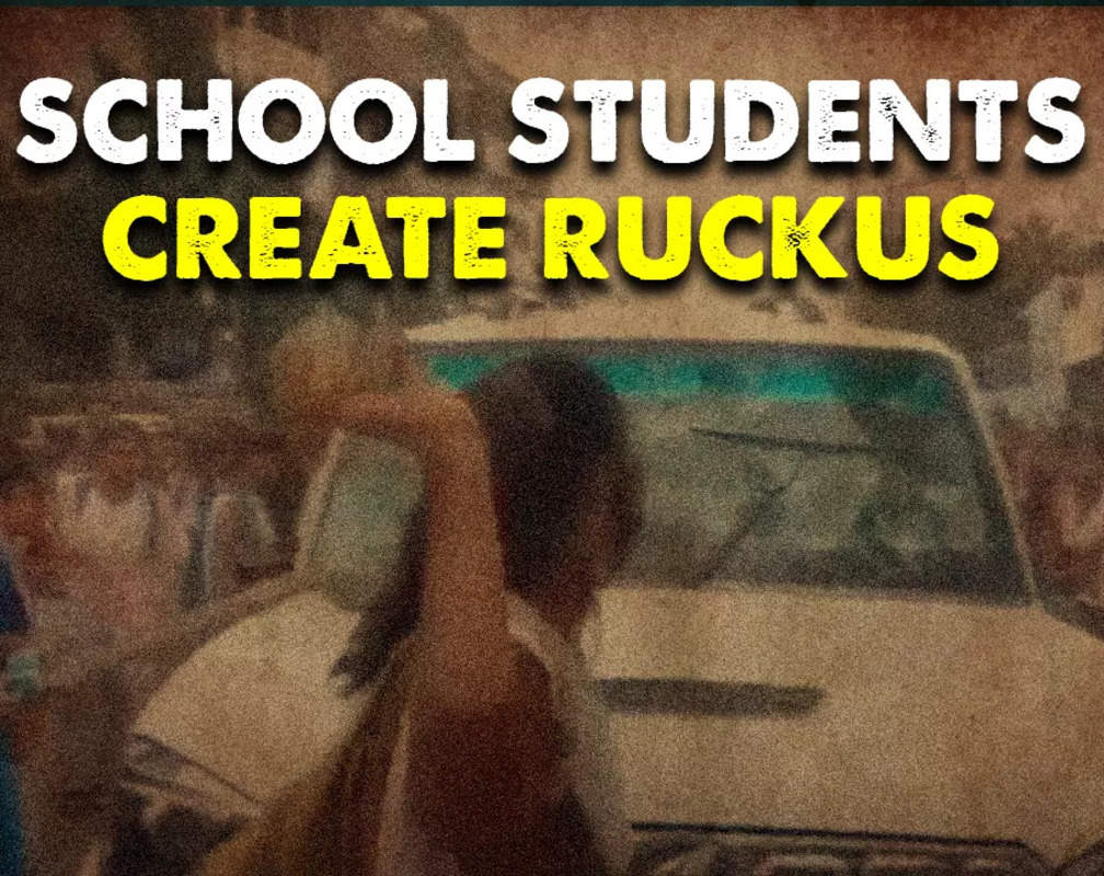 
Watch: Students create ruckus, block road, damage vehicle
